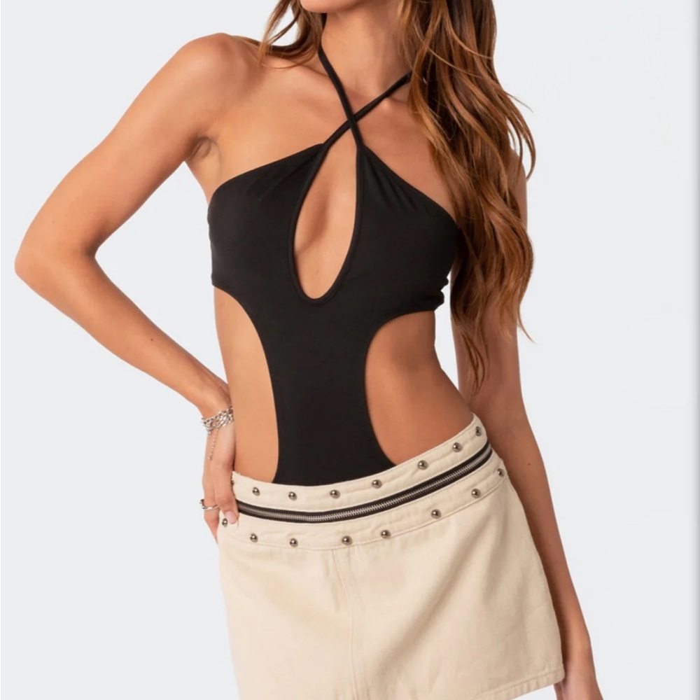 Black going out top